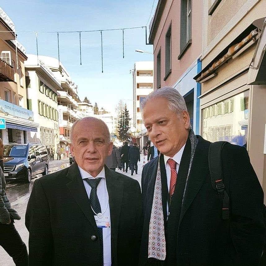 Chaudhary Anjum Jaura, President of the Asia Swiss Business Forum, with a guest on a street in Davos