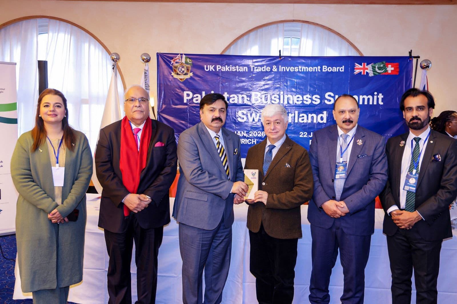 An honoree receiving his award from the organisers