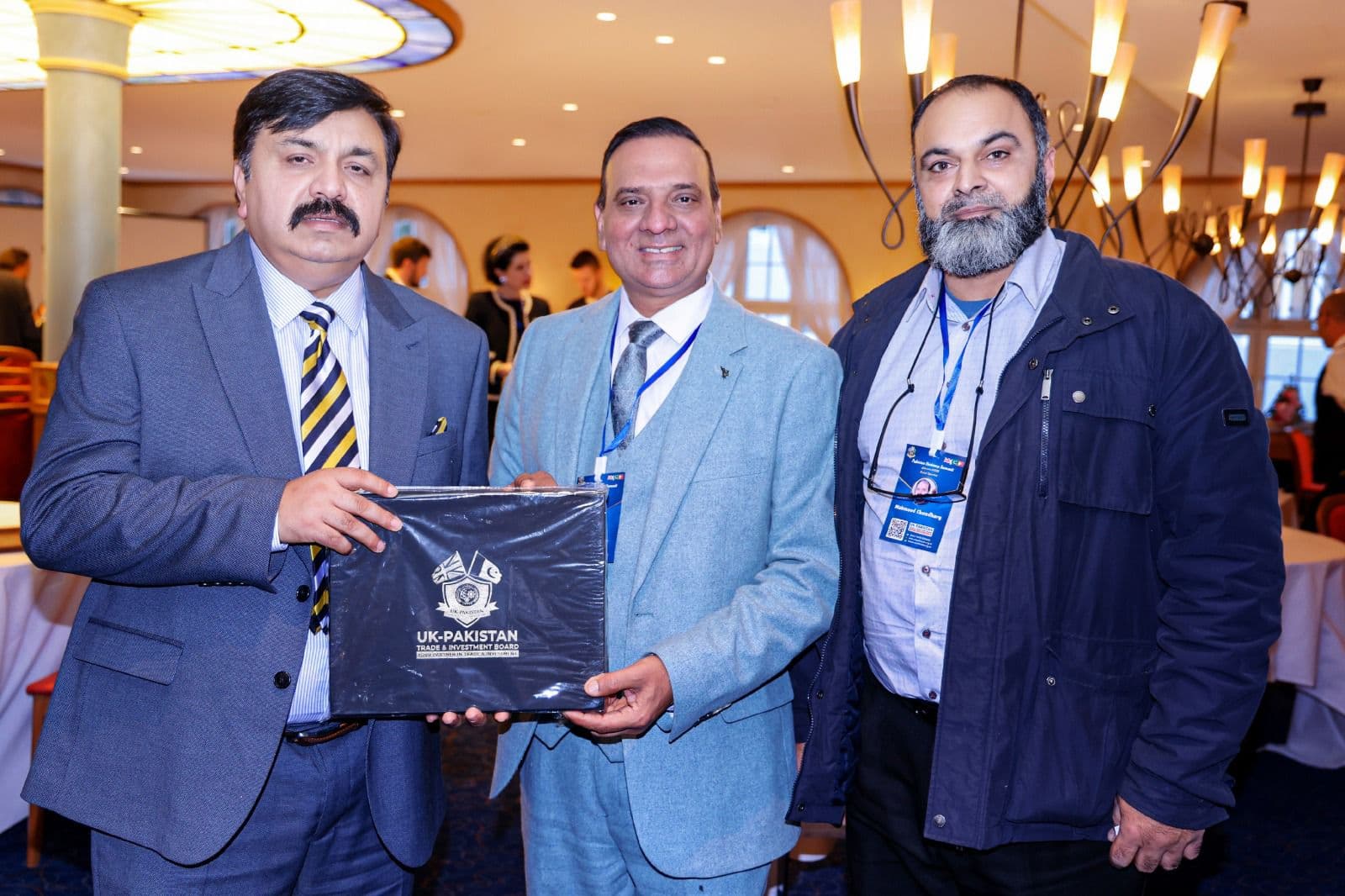 A presentation to a delegate in the summit hall