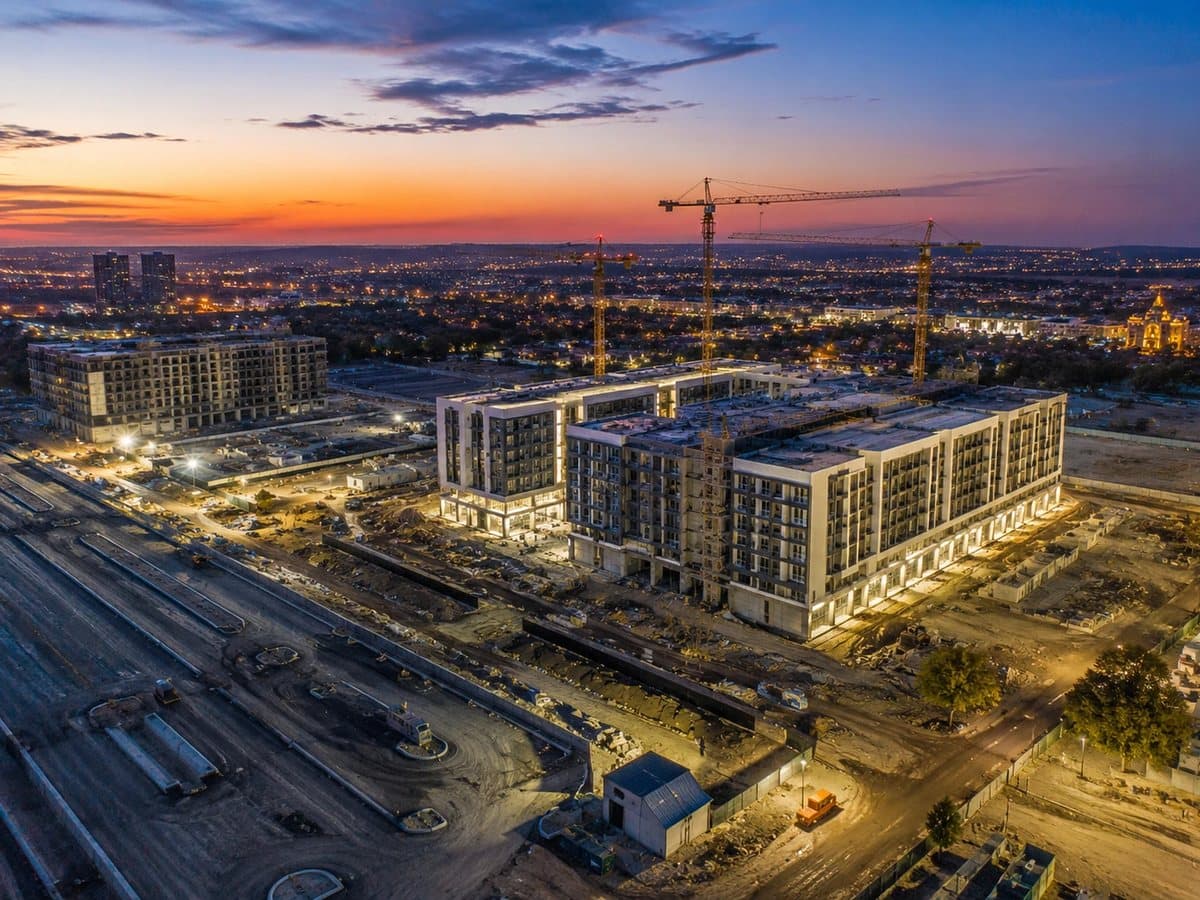 A city infrastructure project under construction at dusk