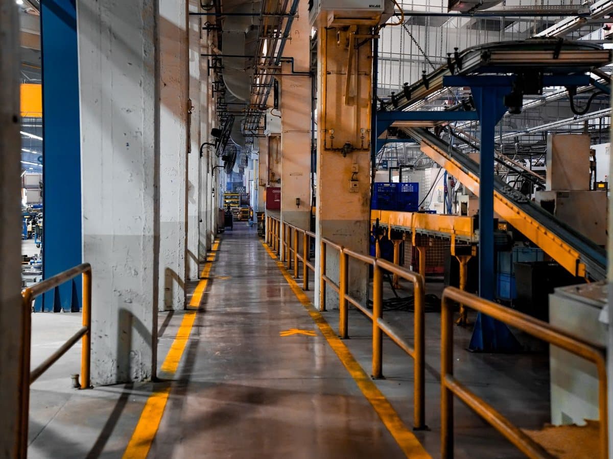 A walkway through a modern manufacturing plant