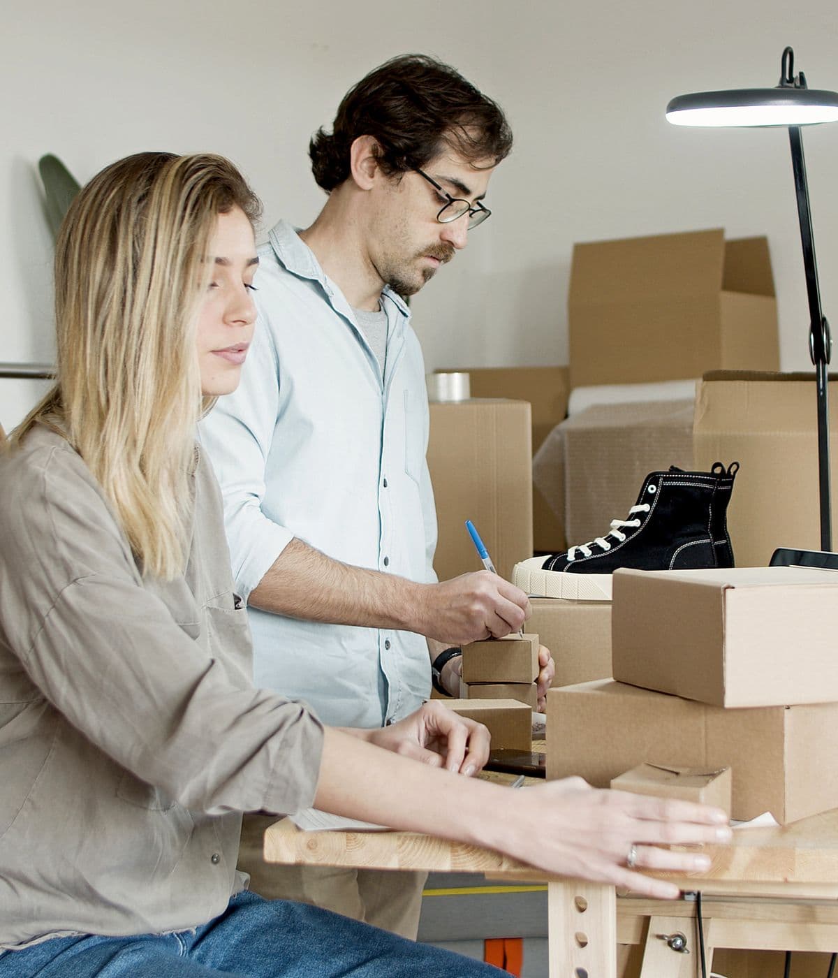 Two entrepreneurs preparing their products in a workshop